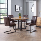 Brooklyn Round Oak Dining Table with 4 Brooklyn Brown Faux Leather Chairs - Pendle Village Furniture
